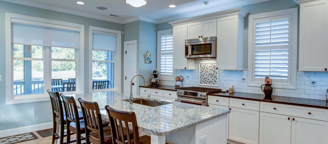 Beautiful luxury kitchen with quarz countertops and view windows.