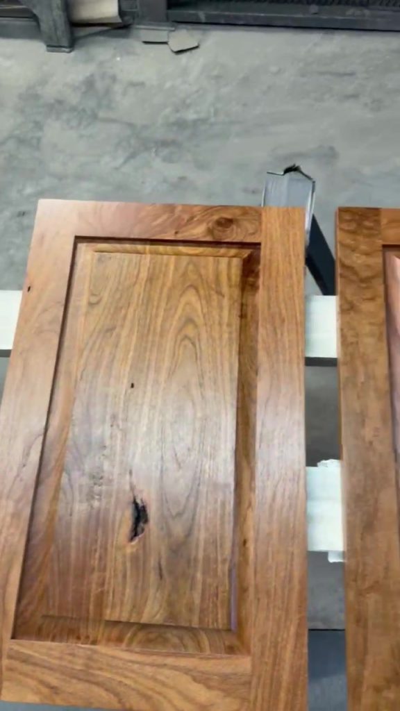 Walnut raised-panel cabinet door built in the LuxeCraft shop in San Antonio
